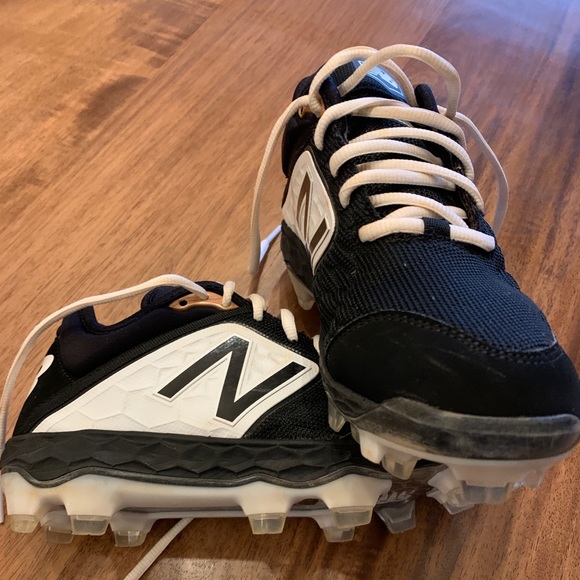 black and white new balance cleats